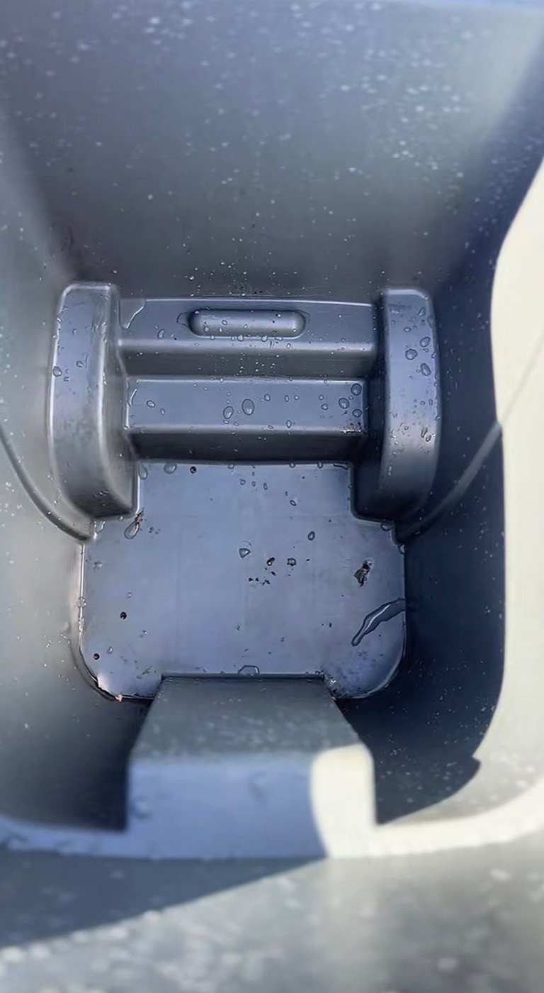 The same Katy, TX trashcans after pressure washing — clean and deodorized